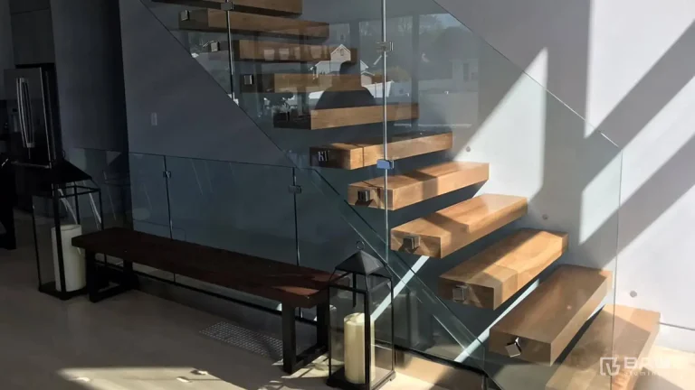 Closeup wood stairs with modern glass railing